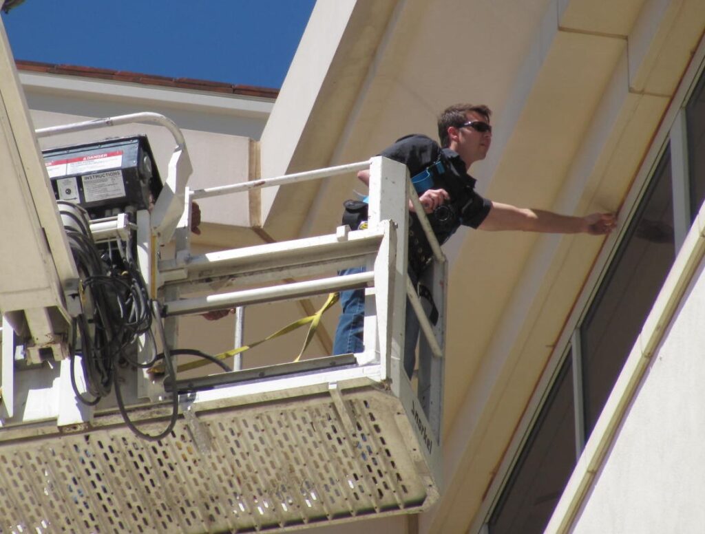 Image of HCG building and envelope consultants inspecting a building